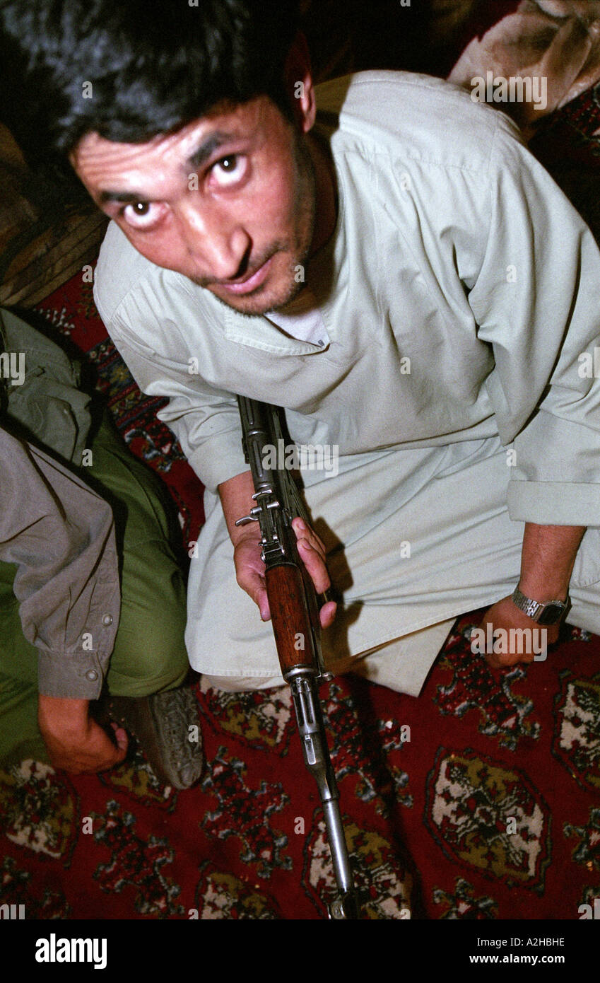 A servant holding an AK-47 at the Kandahar's Governor house Stock Photo