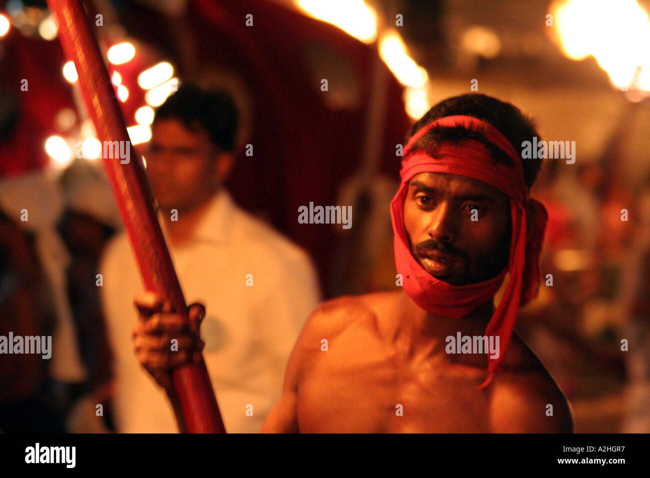 Torch bearer in the great Kandy Esala Perahera festival in Kandy, Sri