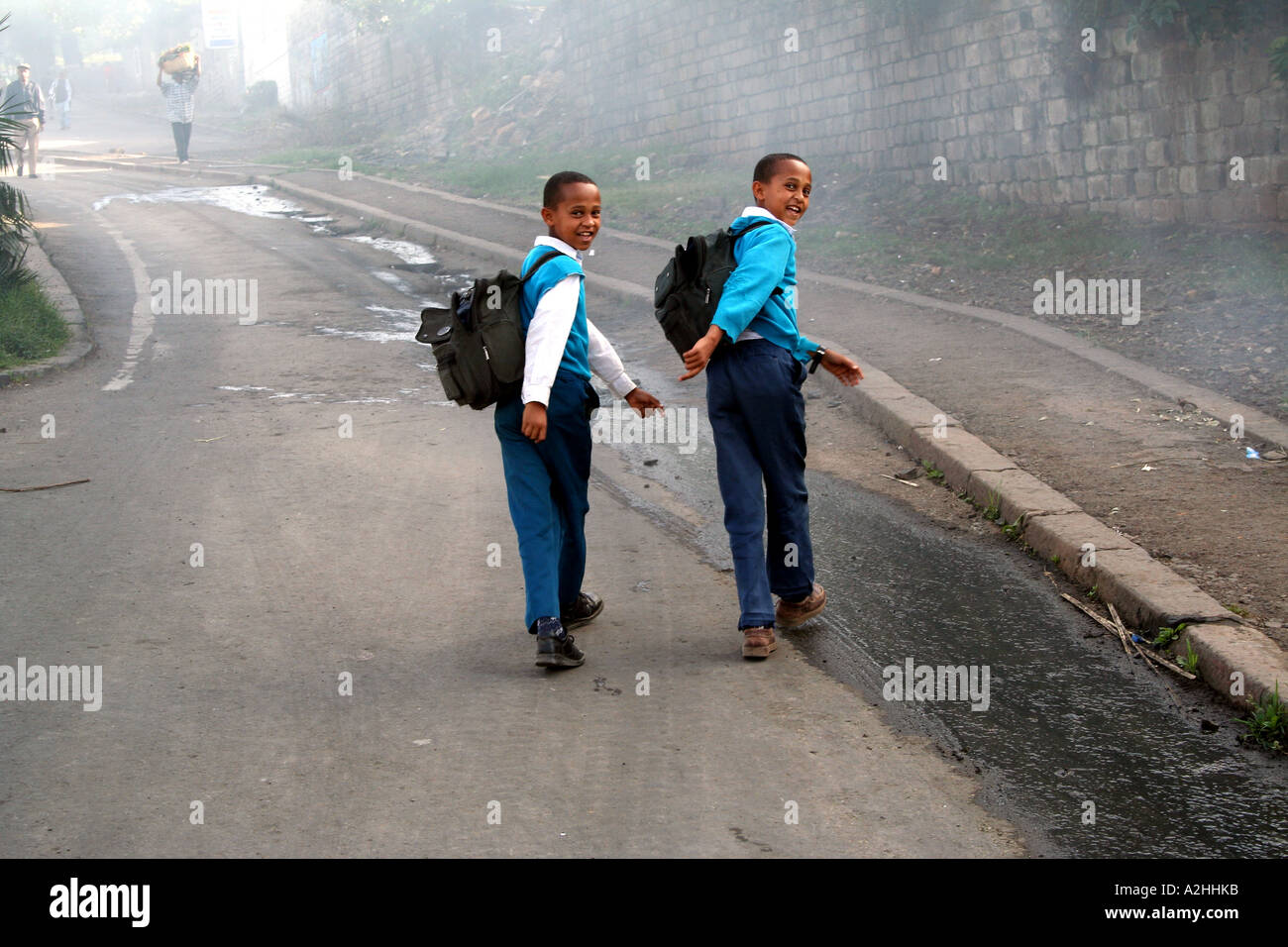 Schoolboys in an Addis Ababa street look back, Addis Ababa, Ethiopia Stock Photo