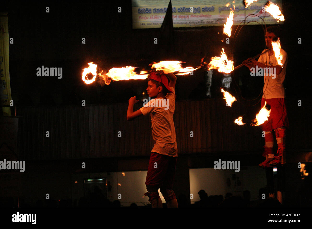 Twirling the flames, in the great Kandy Esala Perahera festival Kandy, Sri Lanka Stock Photo