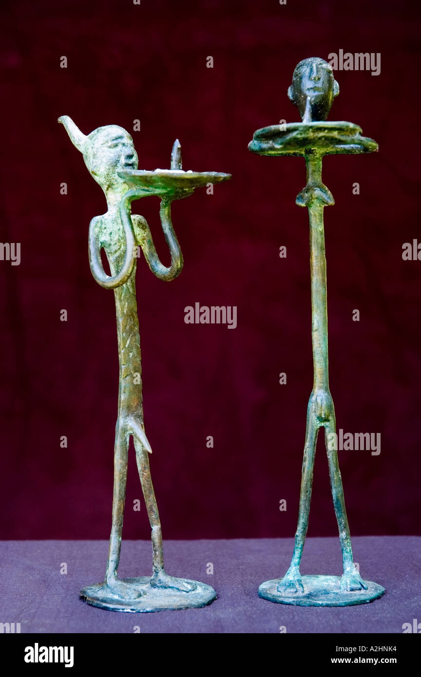 Male and Female cast bronze candle holder figurines. DSC 8220 Stock
