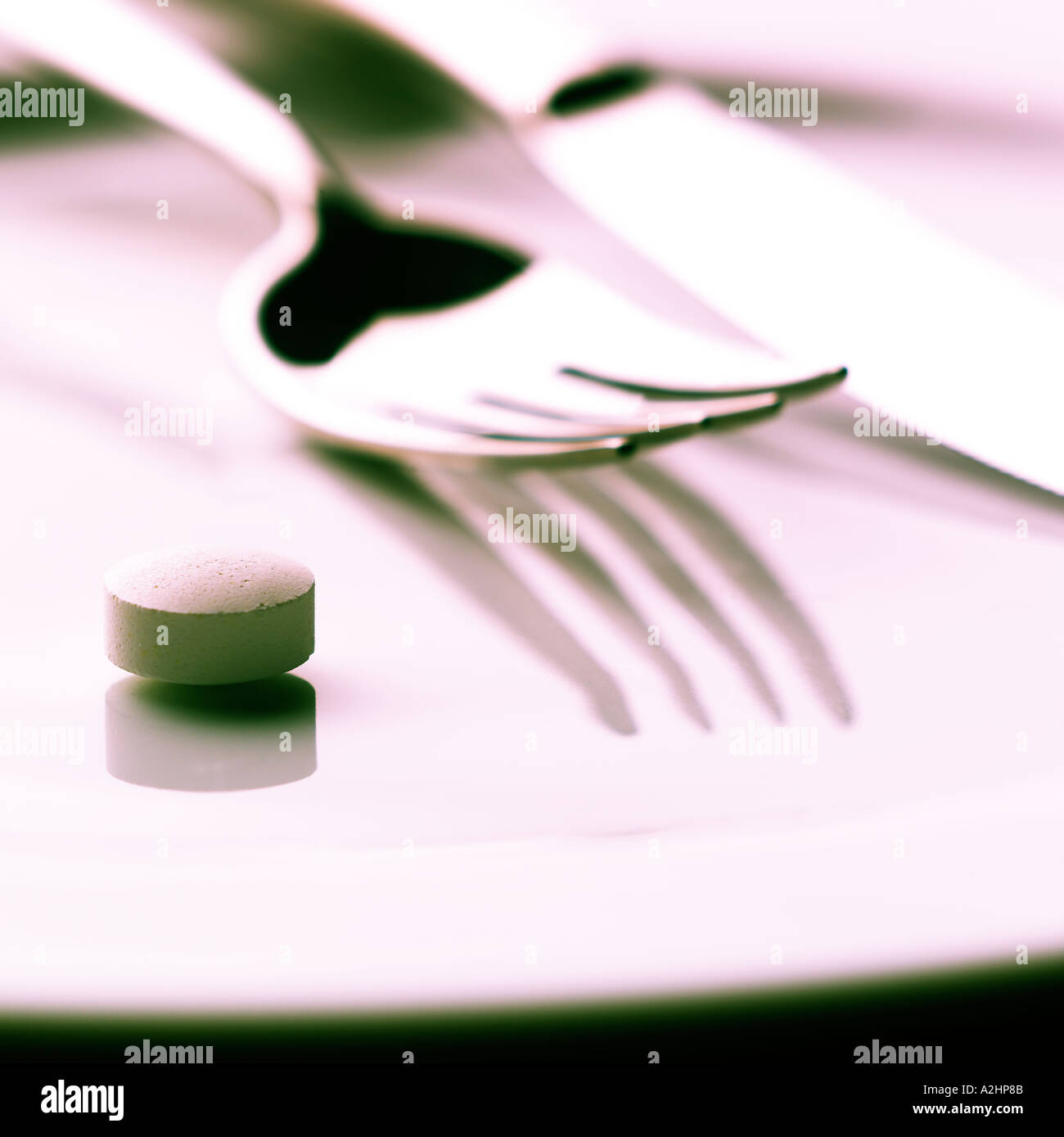 Using a fork and knife hires stock photography and images Alamy