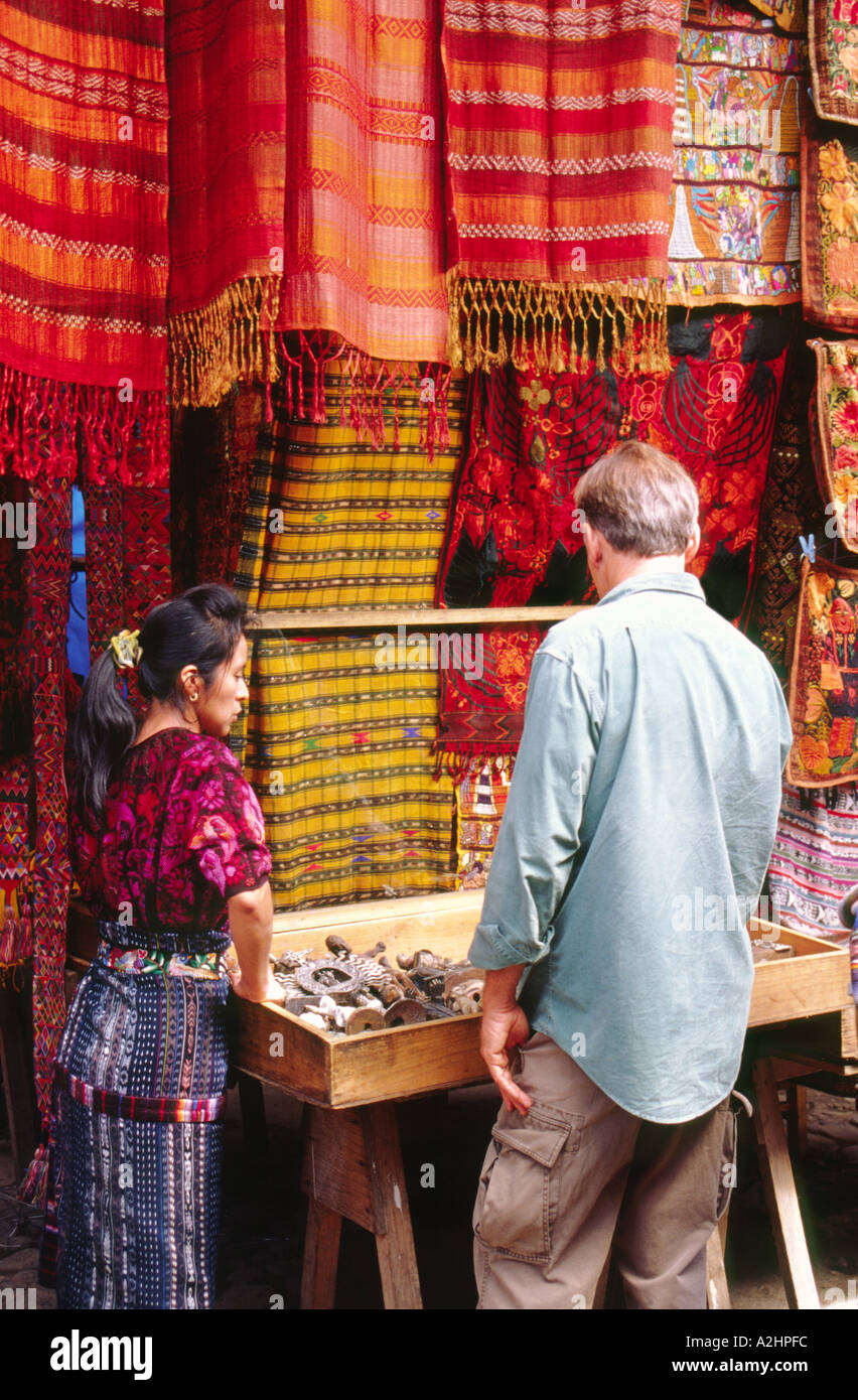 A tourist shopping at Chichicastenango Market in Guatemala Stock Photo