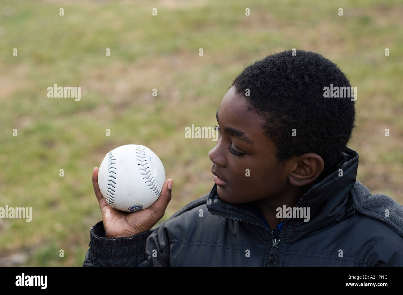 Young boy with baseball Stock Photo