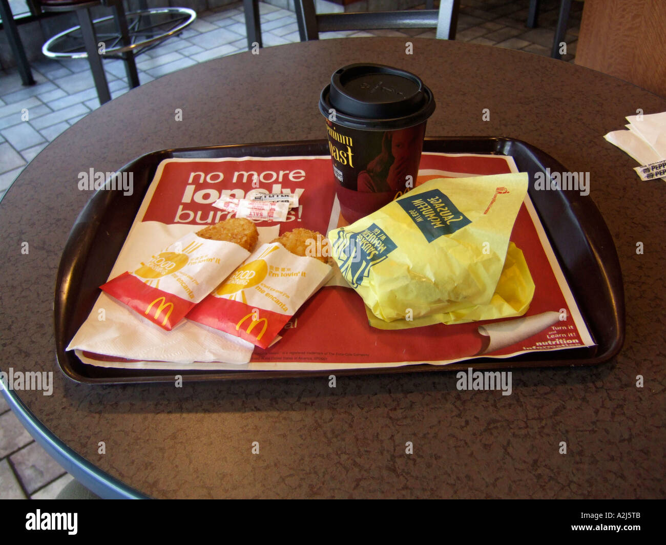 Breakfast tray from McDonald s fast food restaurant includes hash brown