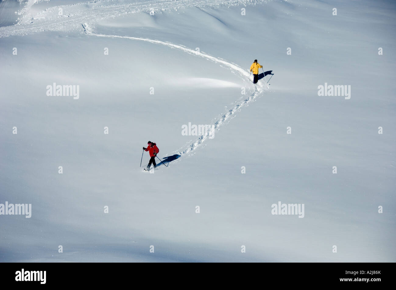 Woman walking though deep snow hi-res stock photography and images - Alamy