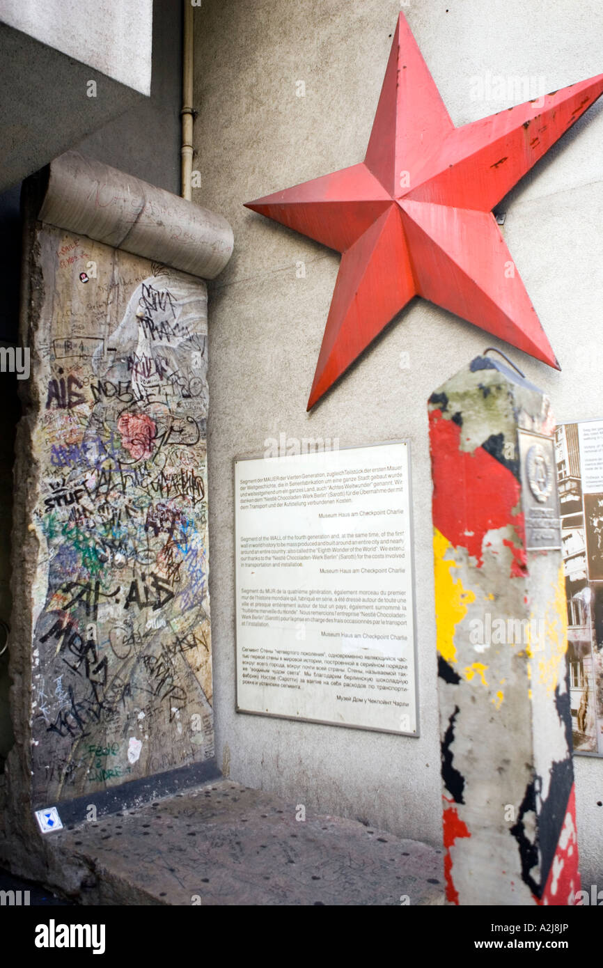 Section of Berlin wall outside Checkpoint Charlie Museum Berlin Germany Stock Photo