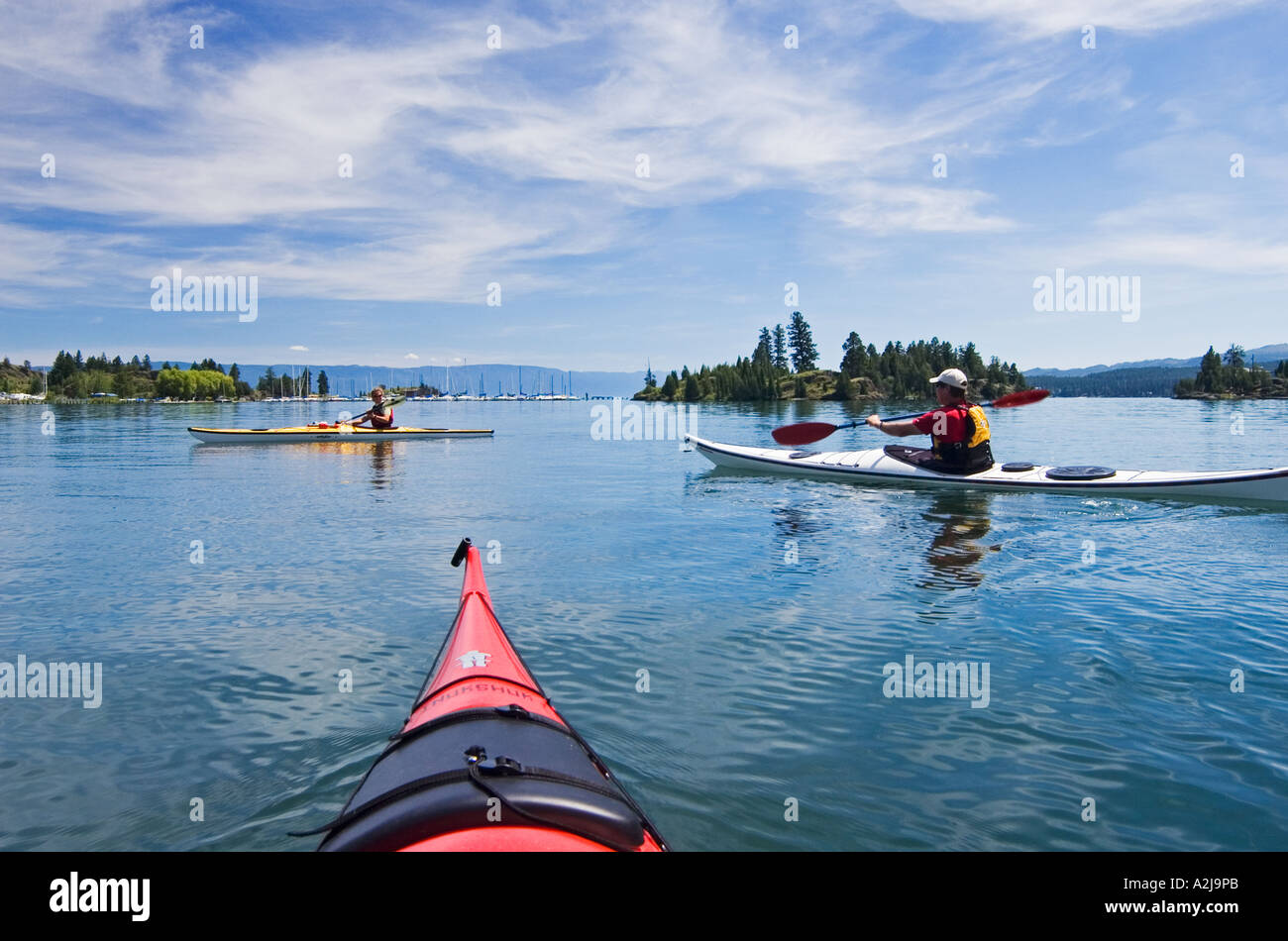 Sea kayaking at Somers Bay Flathead Lake with Silver Moon Kayaks