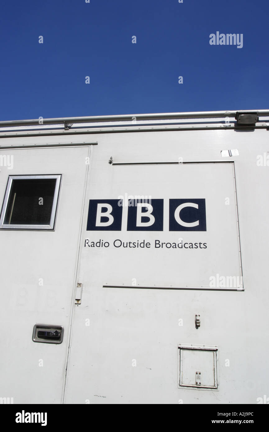 BBC media outside radio broadcast van Stock Photo