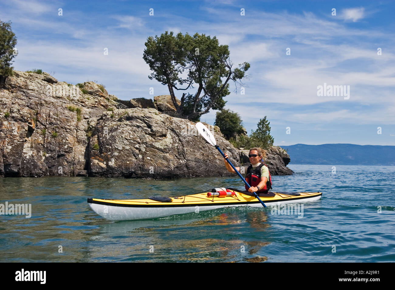 Sea kayaking at Somers Bay Flathead Lake with Silver Moon Kayaks