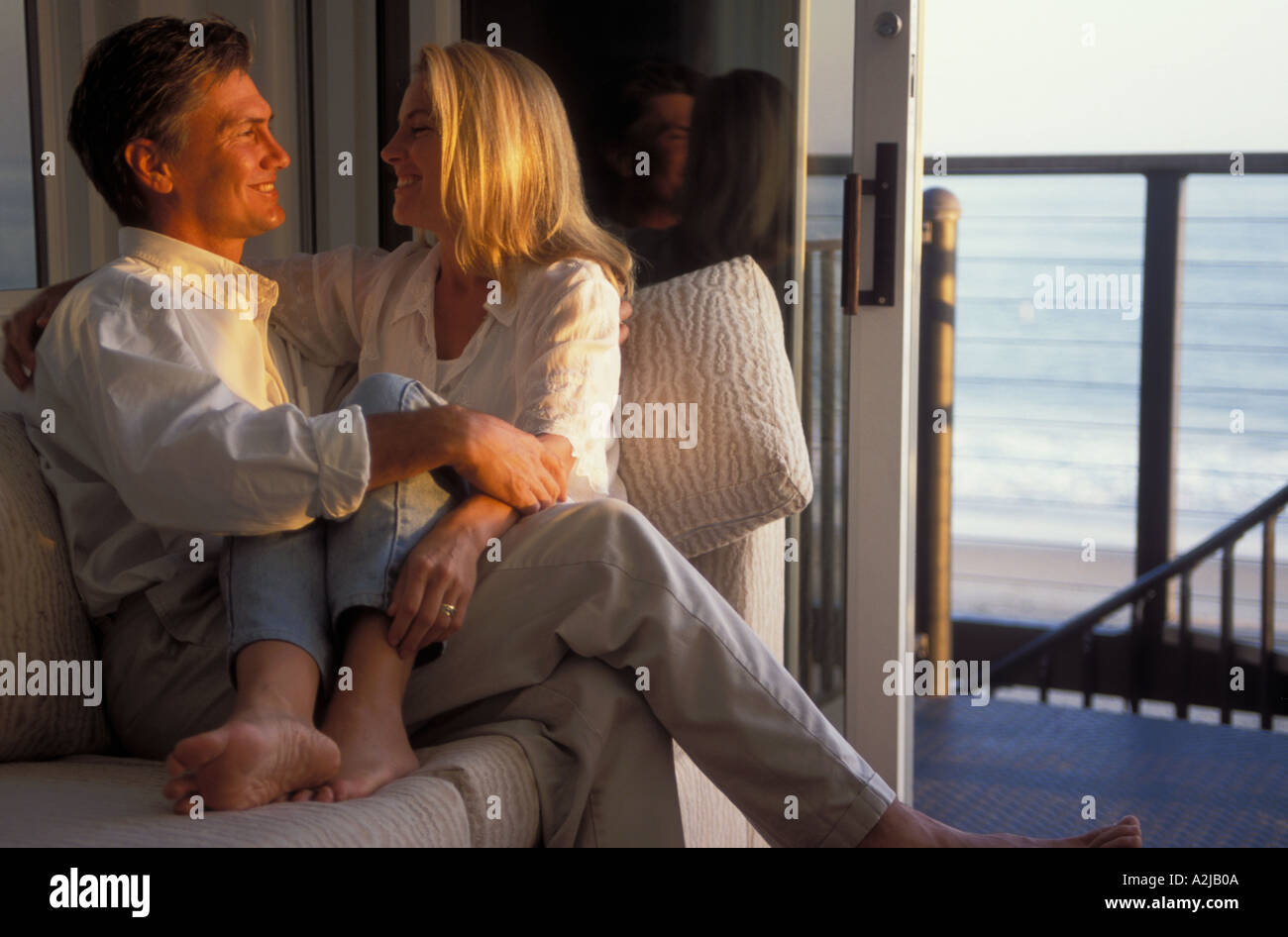 Woman sitting on man lap hi-res stock photography and images - Alamy