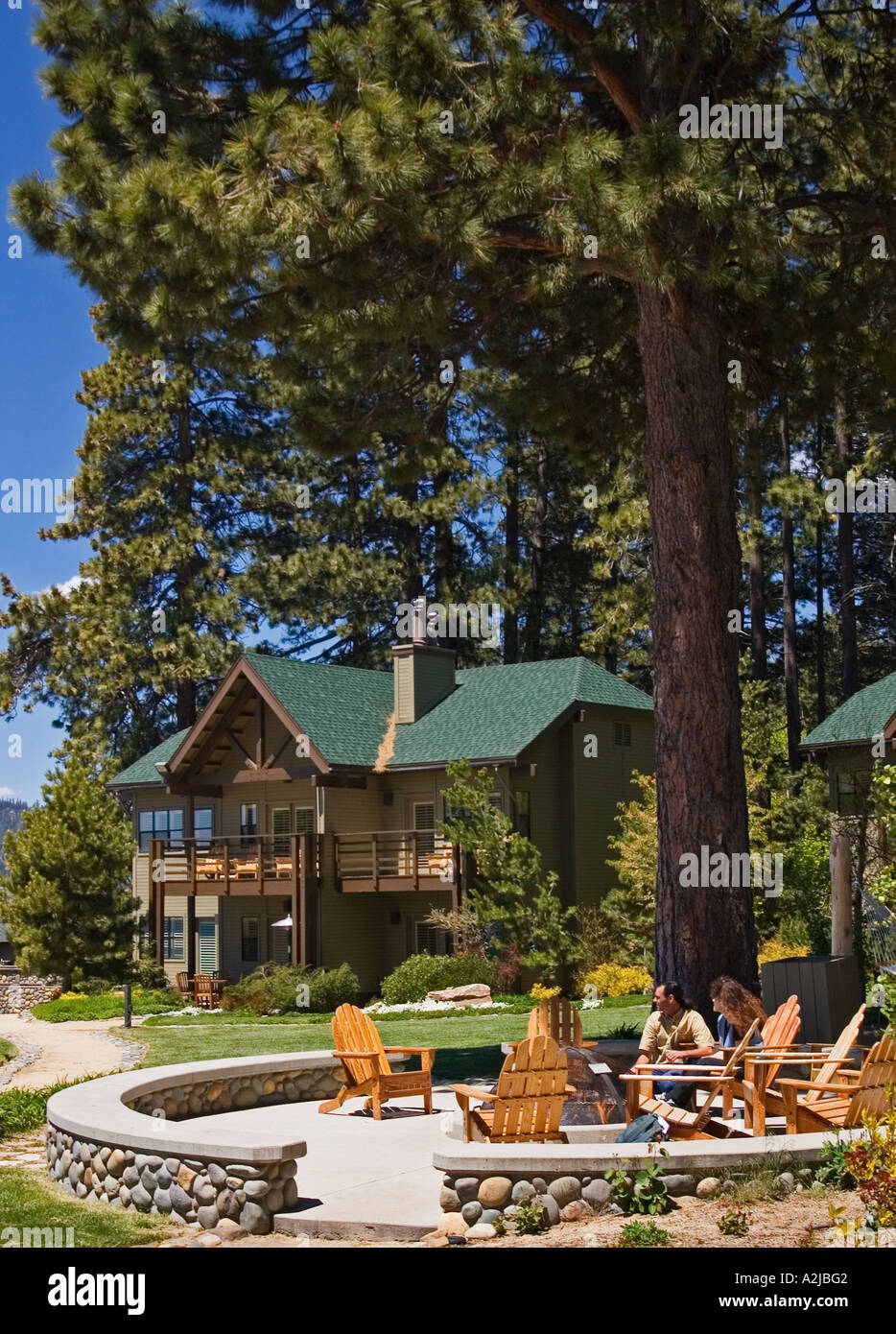 Couple relaxing in gardens at Hyatt Regency Lake Tahoe Resort Spa Casino Incline Village Nevada Stock Photo