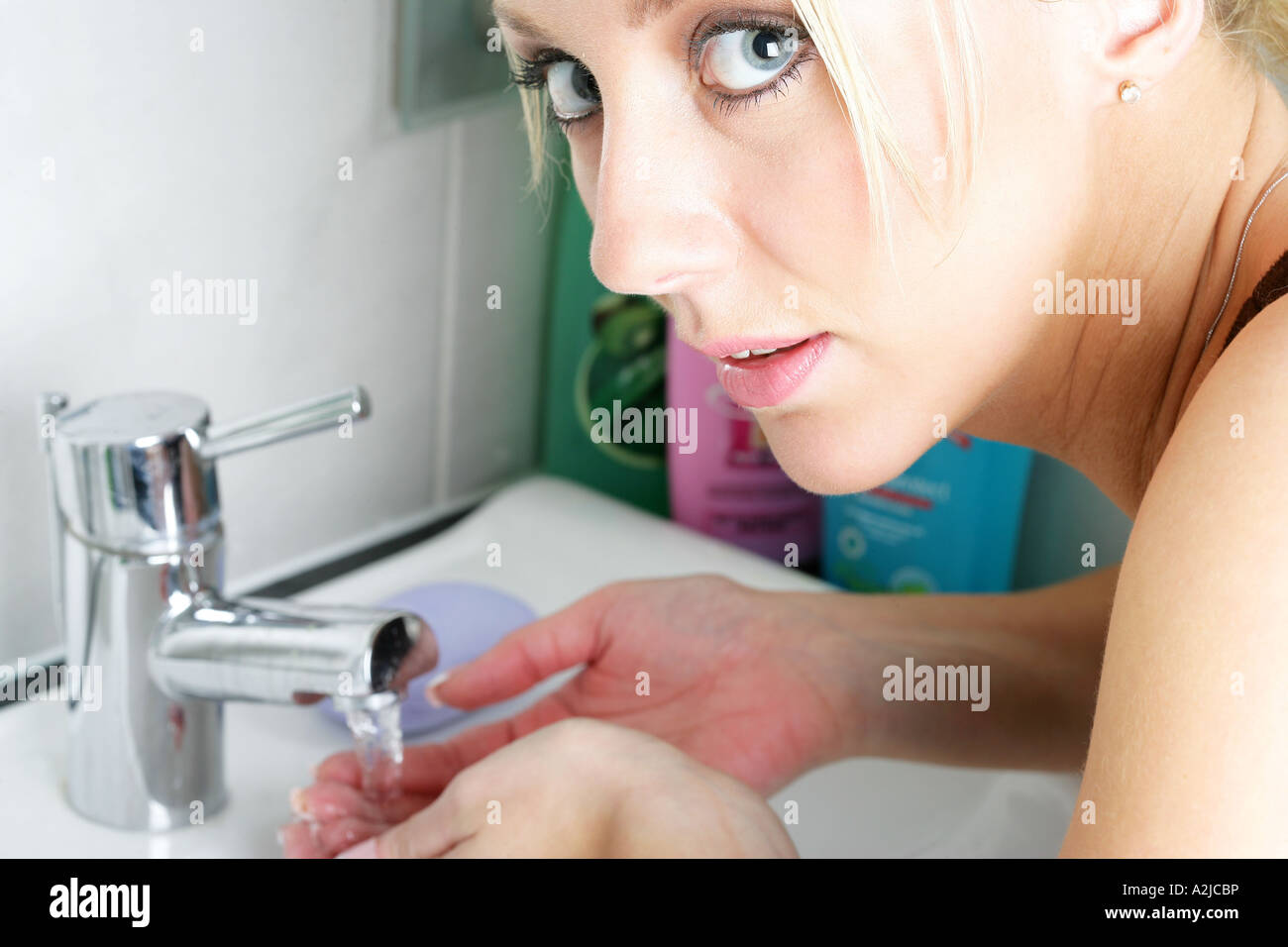 Young Woman Washing Hands with Soap Model Released Stock Photo - Alamy