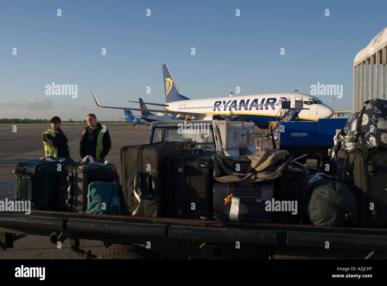 Dublin Airport Ireland Baggage handlers wait to load an aircraft Stock