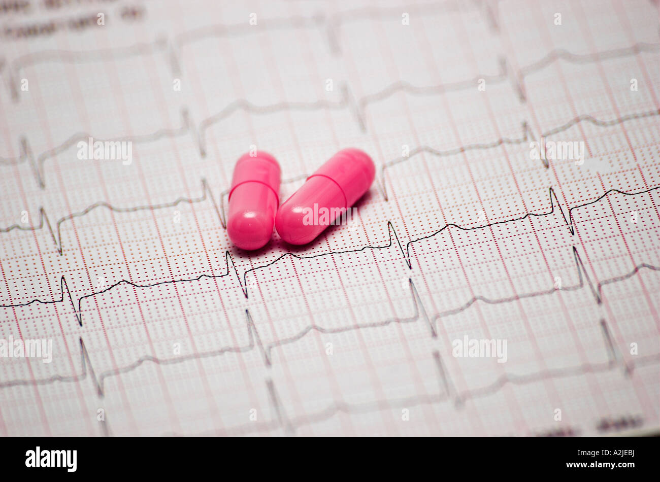 Pills on ECG close up Stock Photo