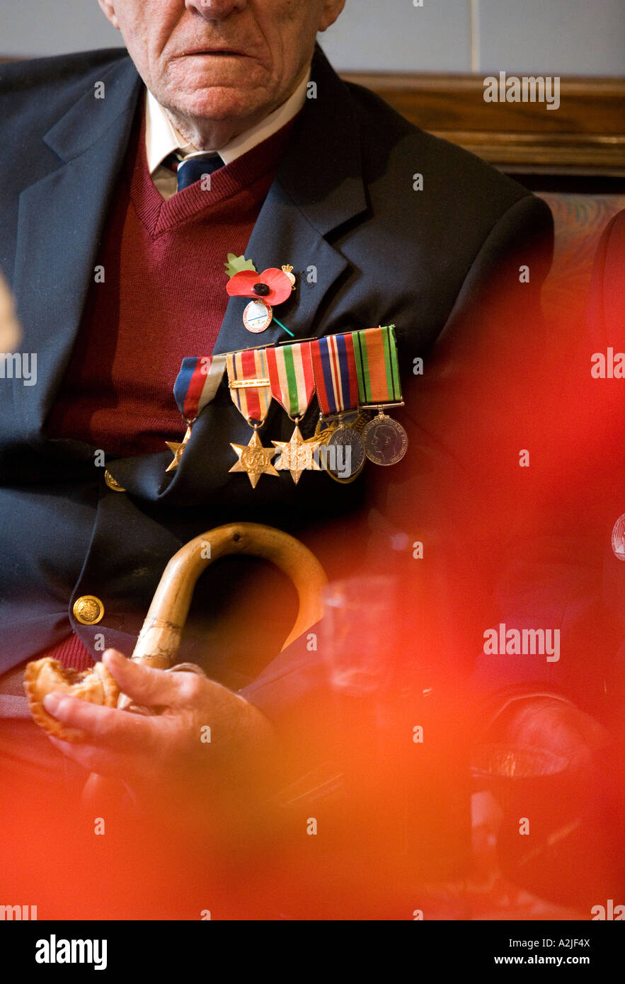 An old soldier wears his medals with pride at an annual Armistice Day service in Birmingham England UK Stock Photo