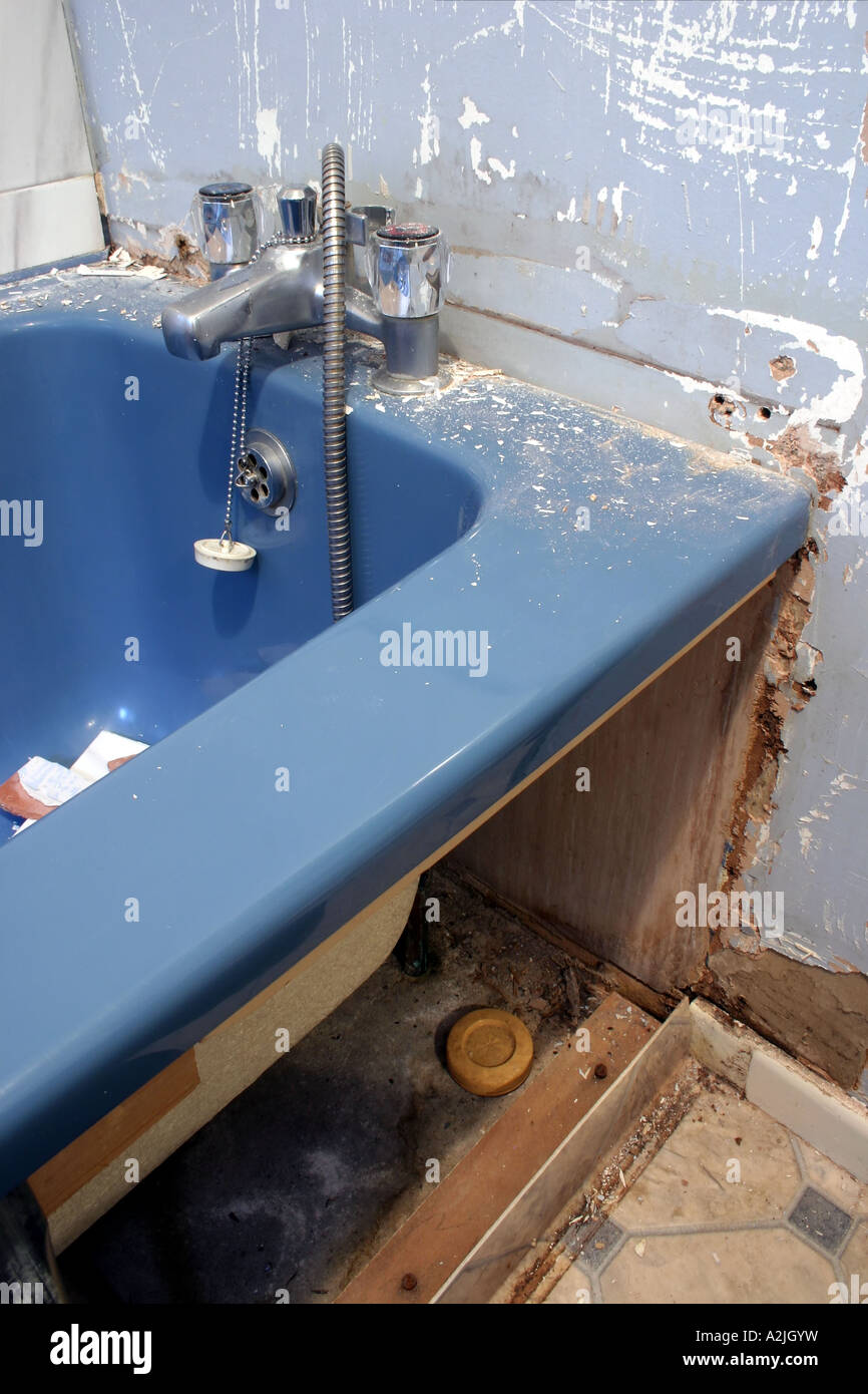 grotty old bathroom being ripped out before renovation Stock Photo Alamy