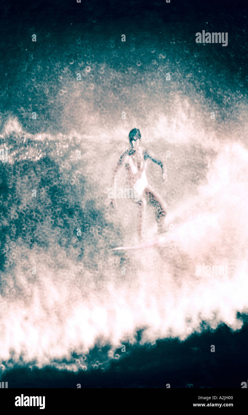 Surfing wave female wet suit hi-res stock photography and images - Alamy