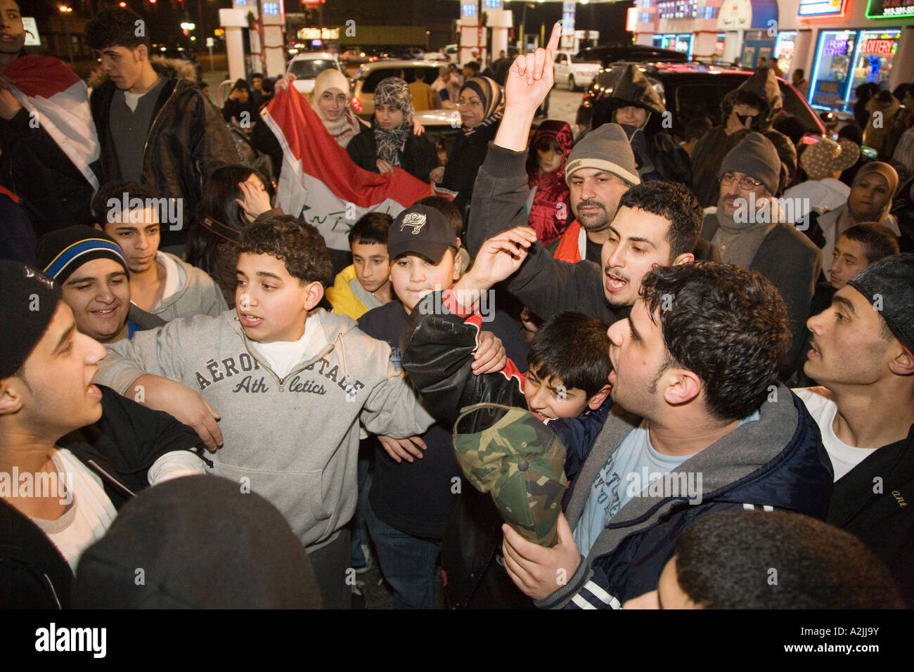 Iraqi Americans Celebrate Hanging of Saddam Hussein Stock Photo