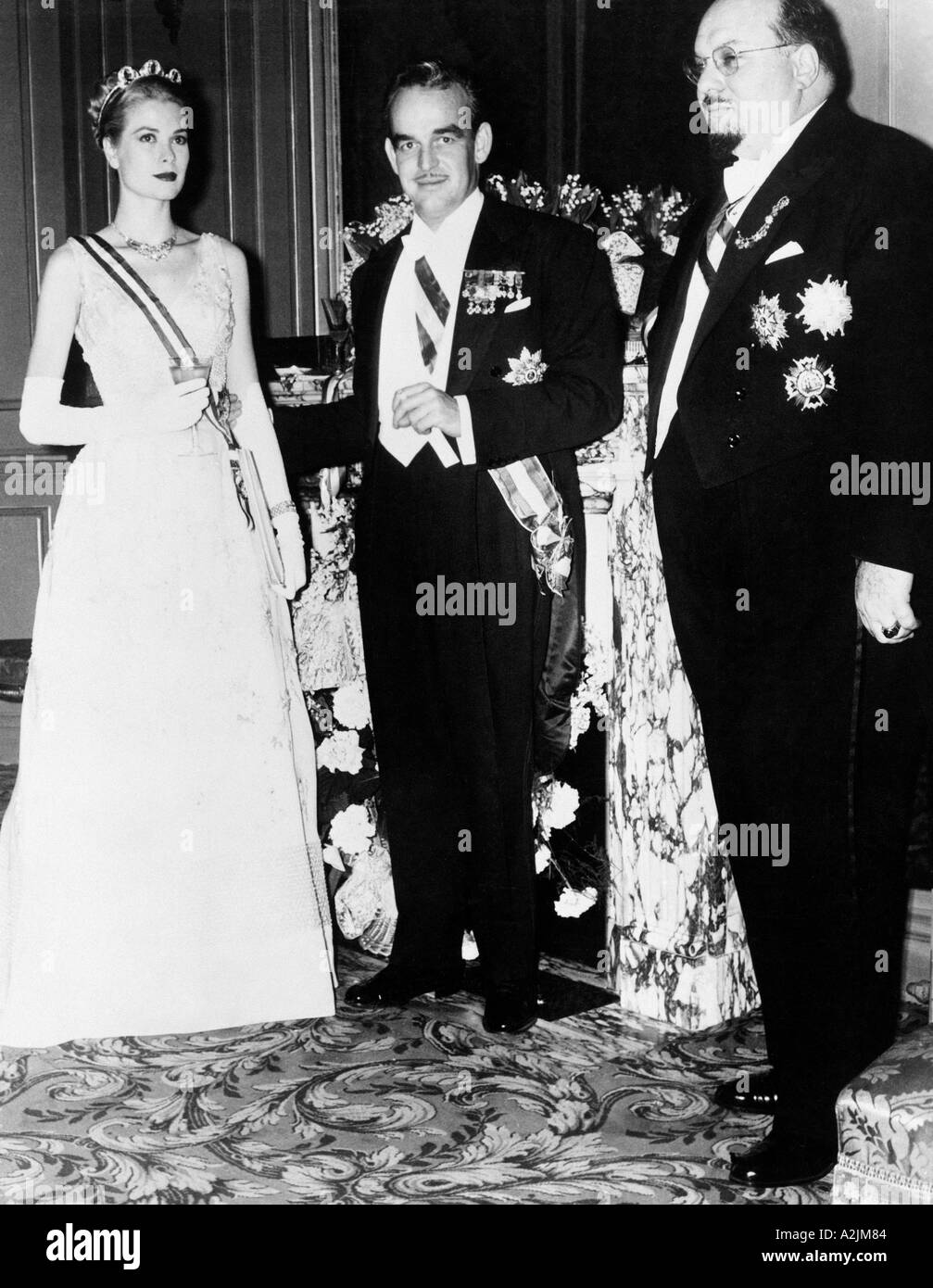 GRACE KELLY with husband prince Ranier of Monaco and ex King Farouk of Egypt Stock Photo