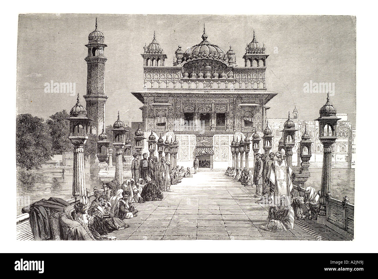 India Punjab Amritsar Golden gold Temple Sikh Sikhism spiritual shrine pilgrim religion island marble colonial sacred worship or Stock Photo