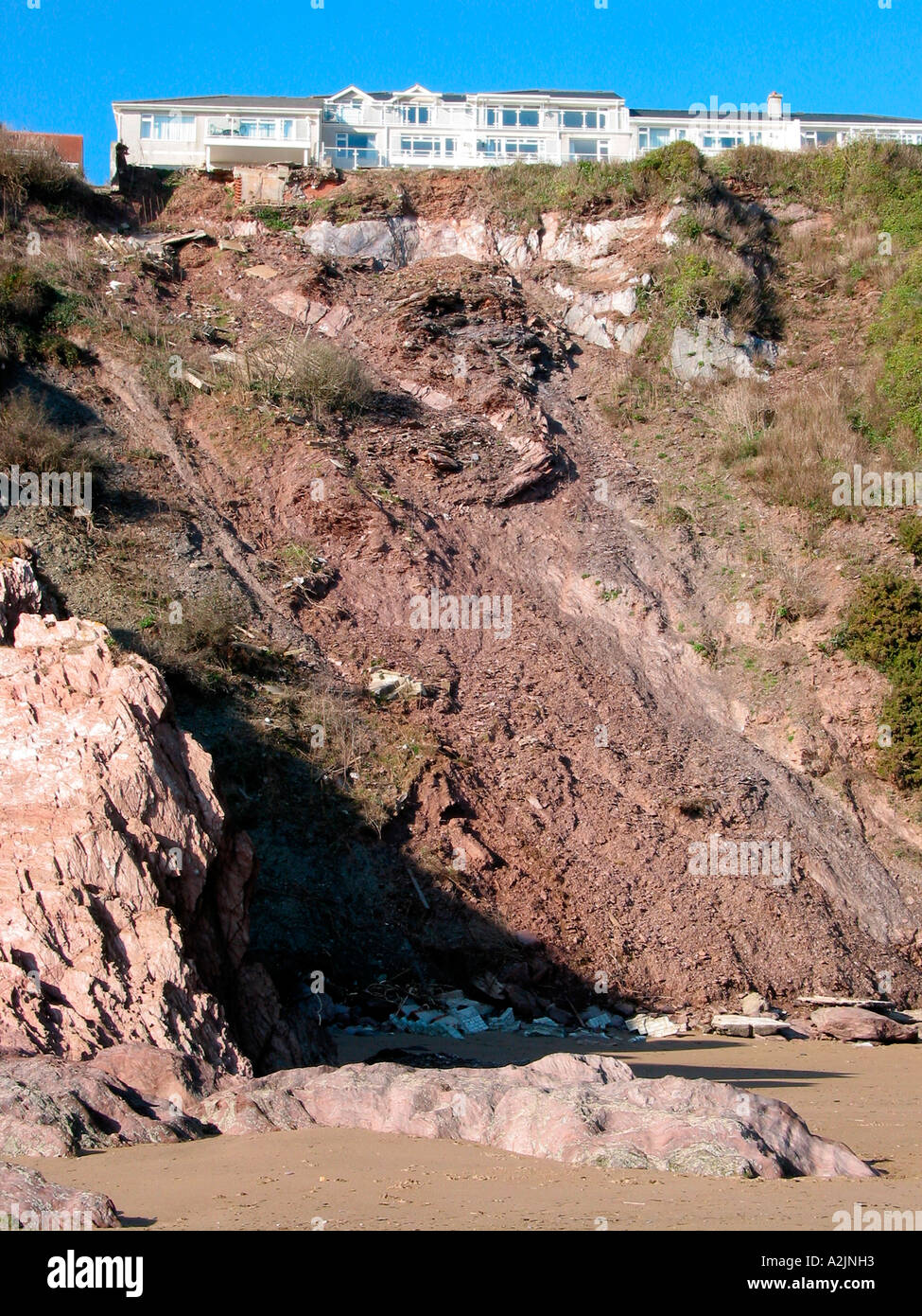 Coastal erosion on a cliffside. Bigbury on Sea, South Devon. UK Stock