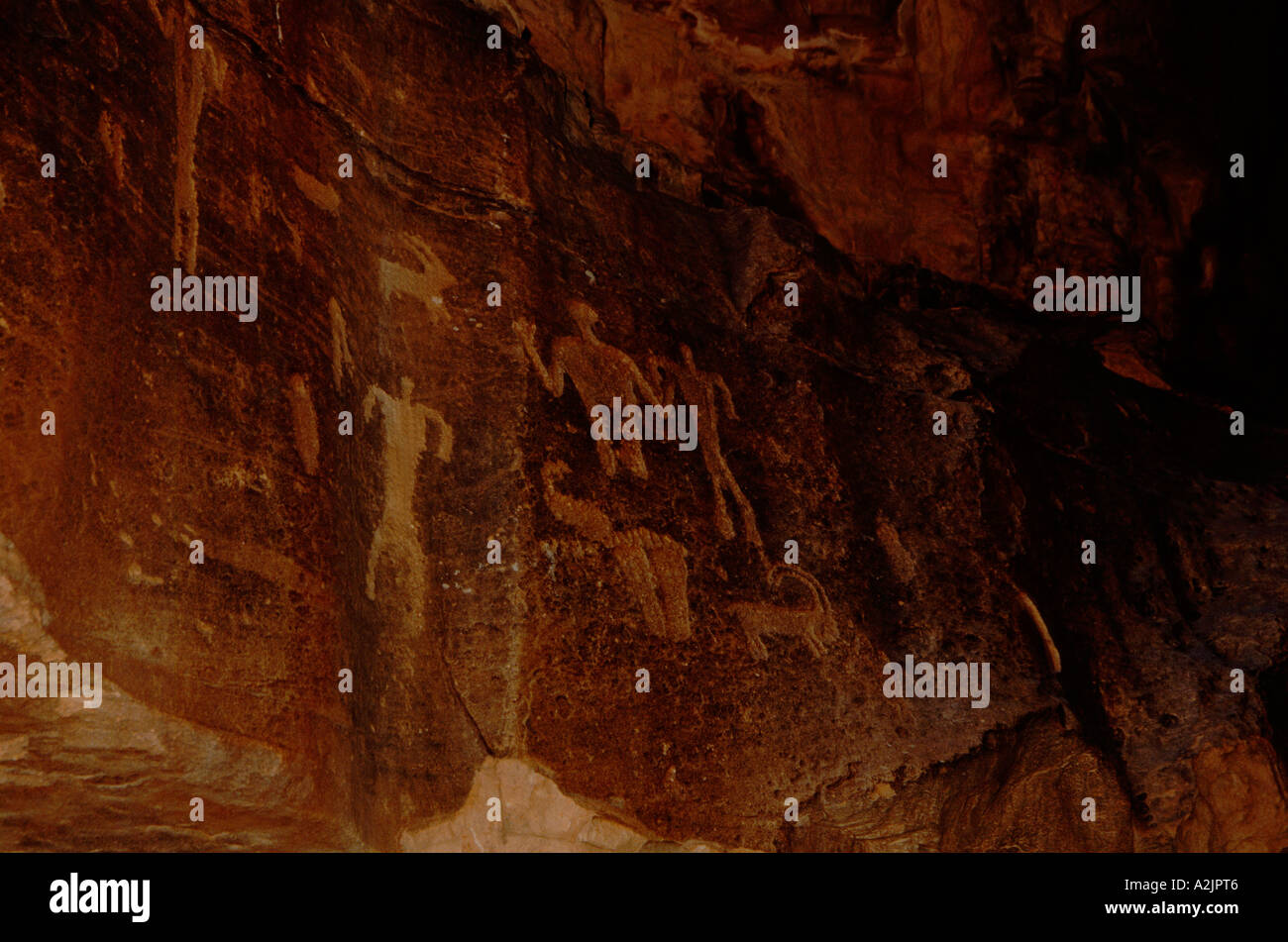 Asia, Jordan, Wadi Rum, Rock art depicting hunting scenes left by nomads and hunters from 4th centruy BC Stock Photo