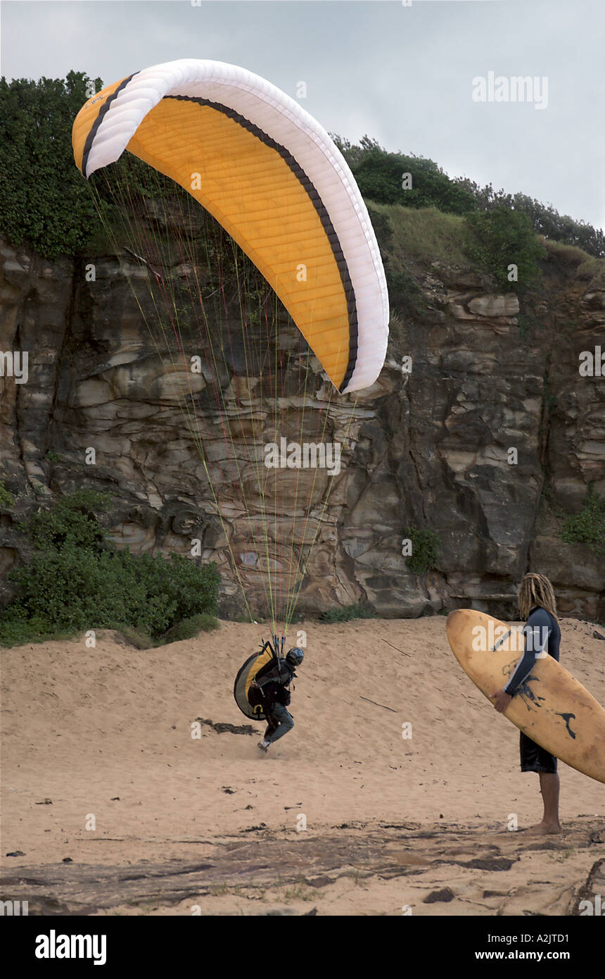 Stanwell Park Paraglider and Surfer Australia Stock Photo