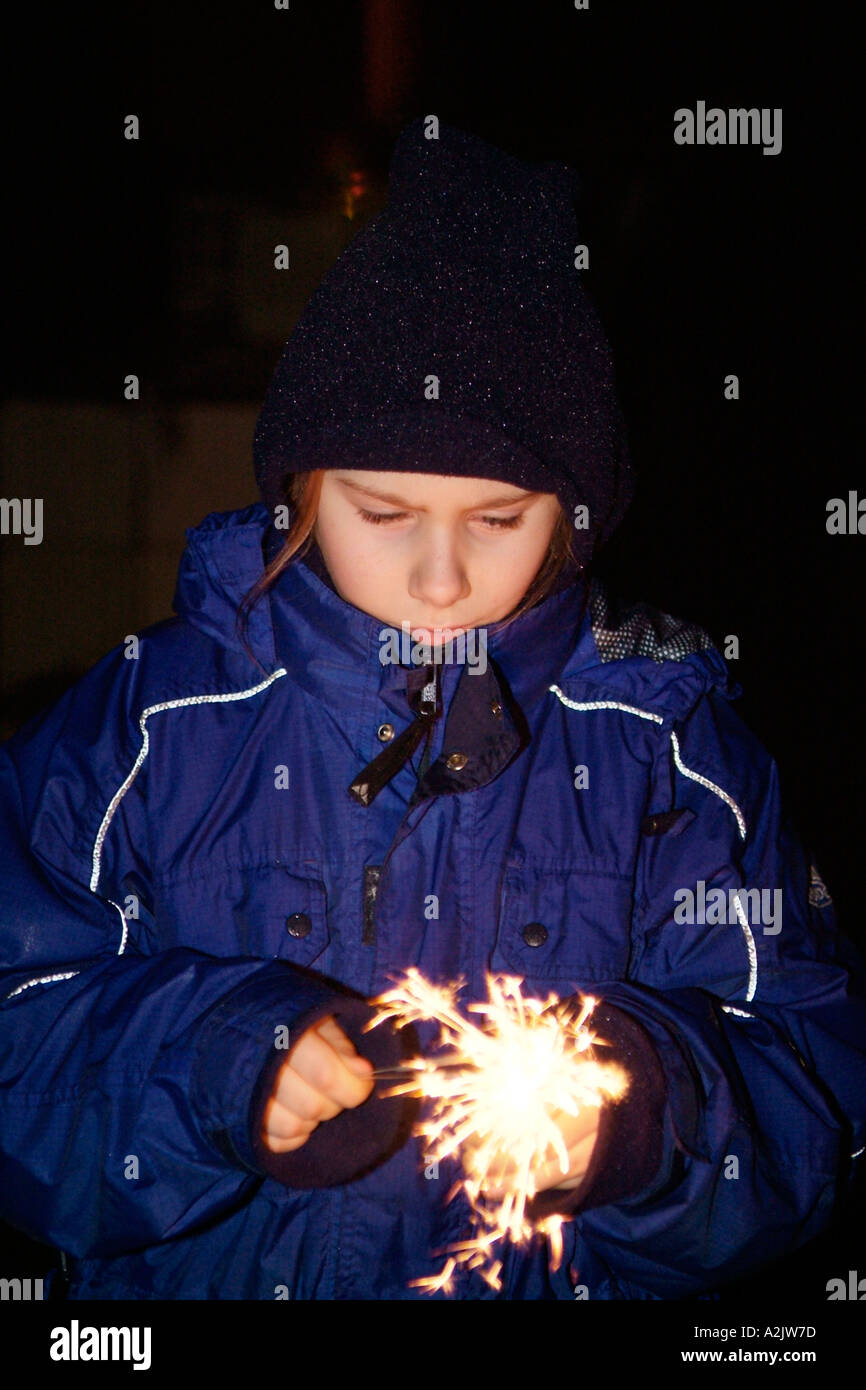 child with sparkler Stock Photo
