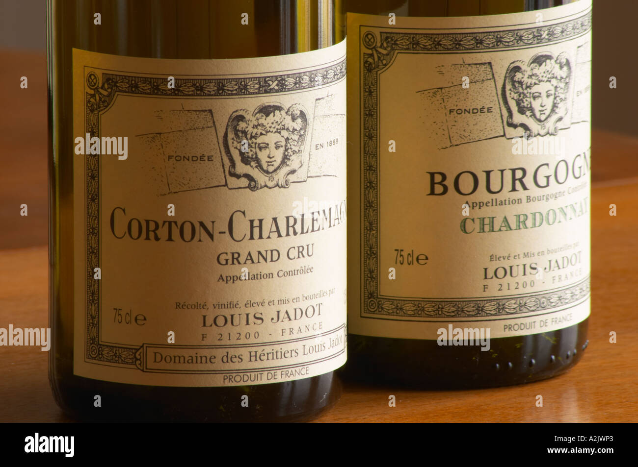 Two bottles of white Burgundy wine from Louis Jadot Corton Charlemagne