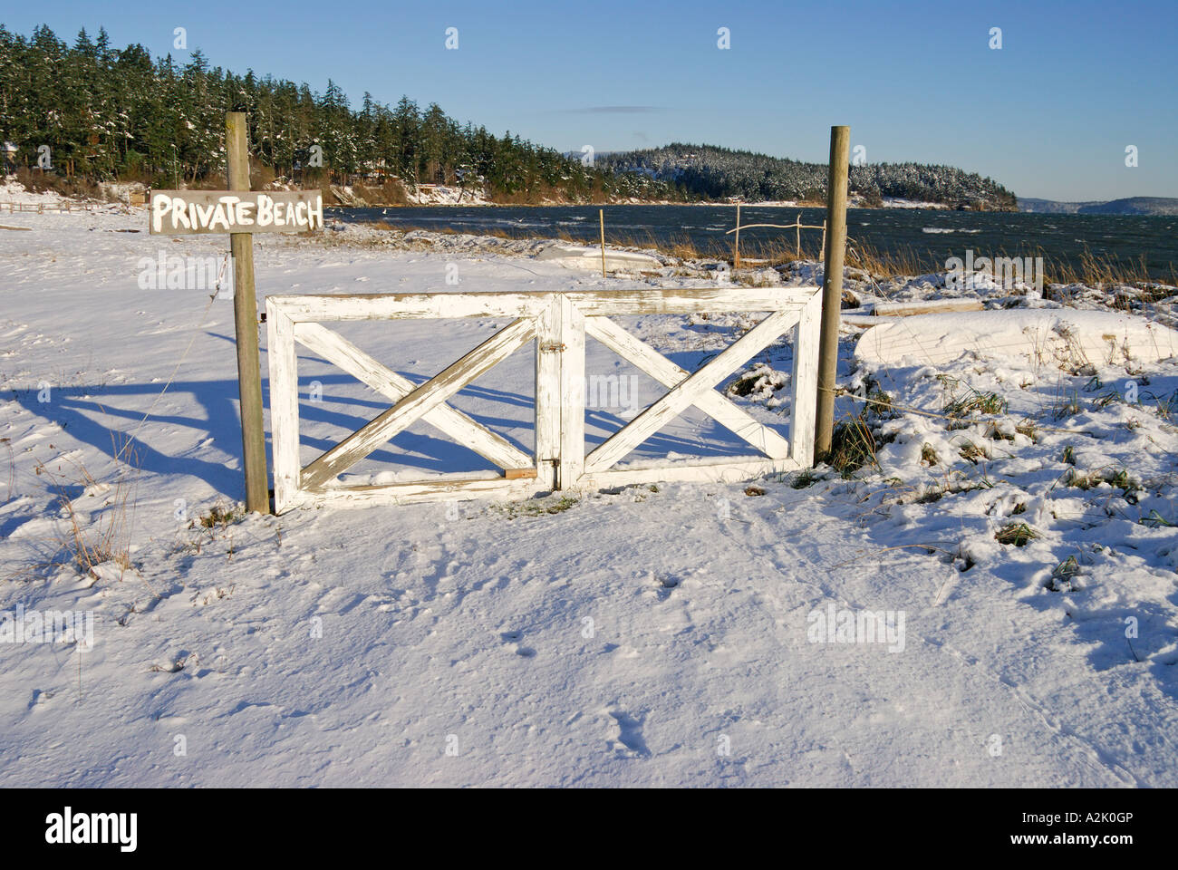"Private Beach sign on "snow covered" coast, "Lopez Island", "San Juan County", "Washington State", USA" Stock Photo