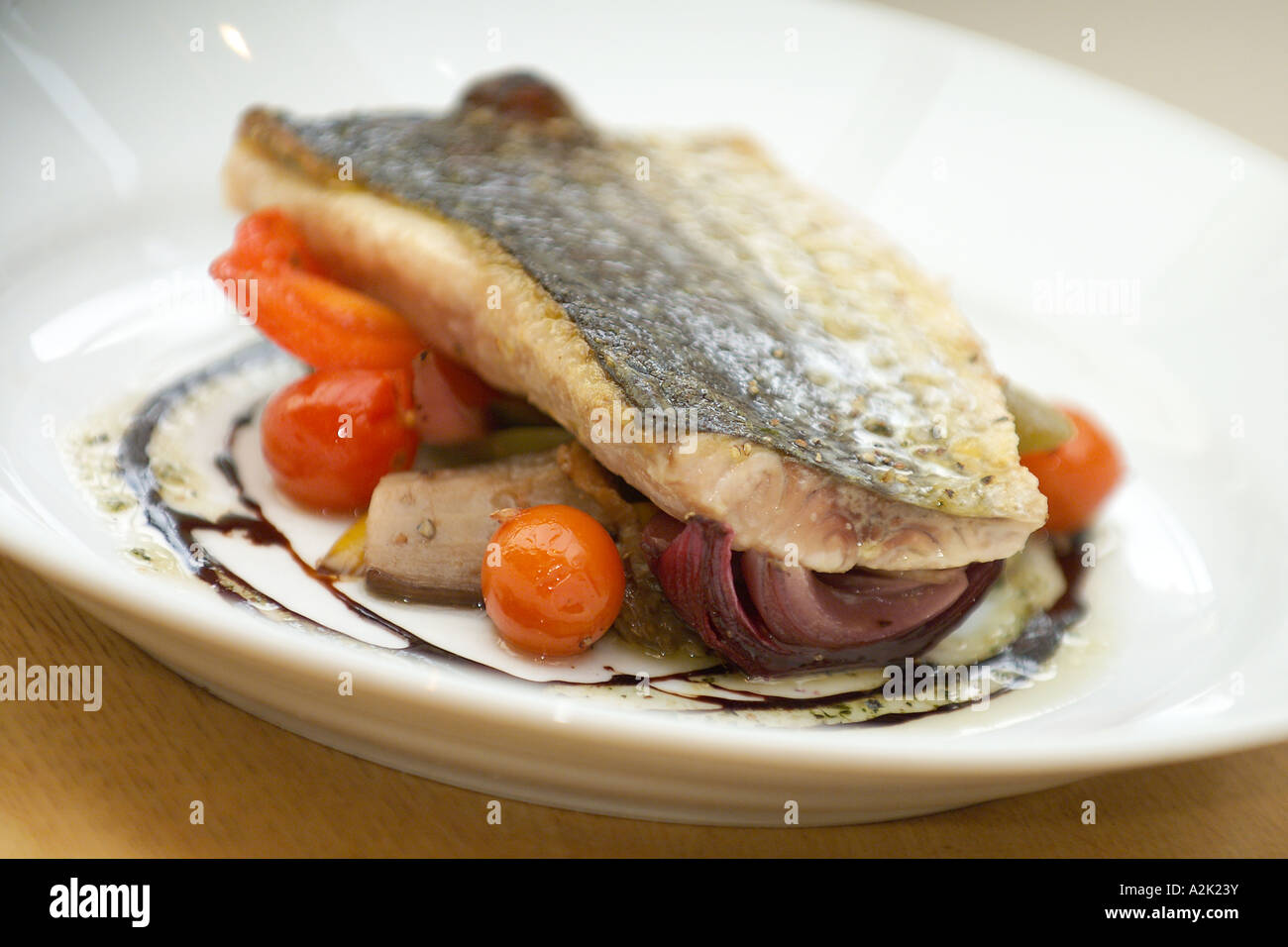 Fillet of Sea Bass pan fried Stock Photo Alamy