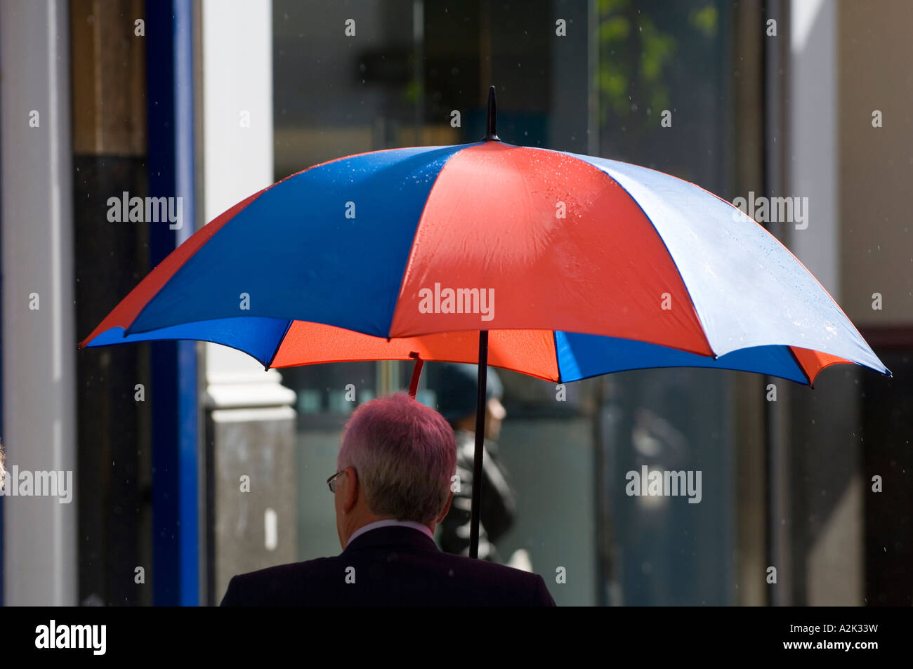 umbrella in rain show Belfast Stock Photo Alamy