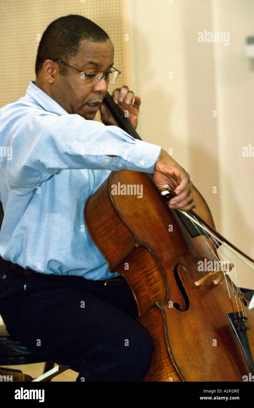 NA, USA, Washington, Bellevue. An instructor at Music Works Northwest, a non-profit community music school Stock Photo