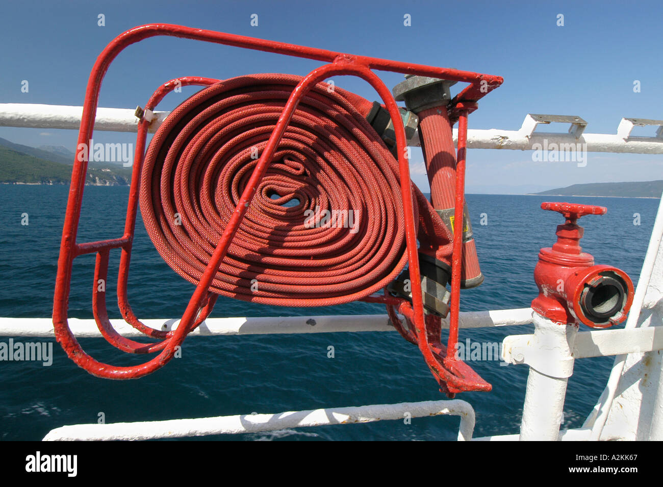 fire fighting equipment with water hose on a ferry boat Stock Photo