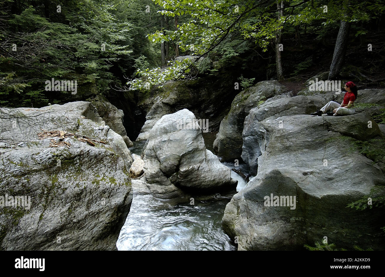 Female hiker resting waterfall hi-res stock photography and images - Alamy