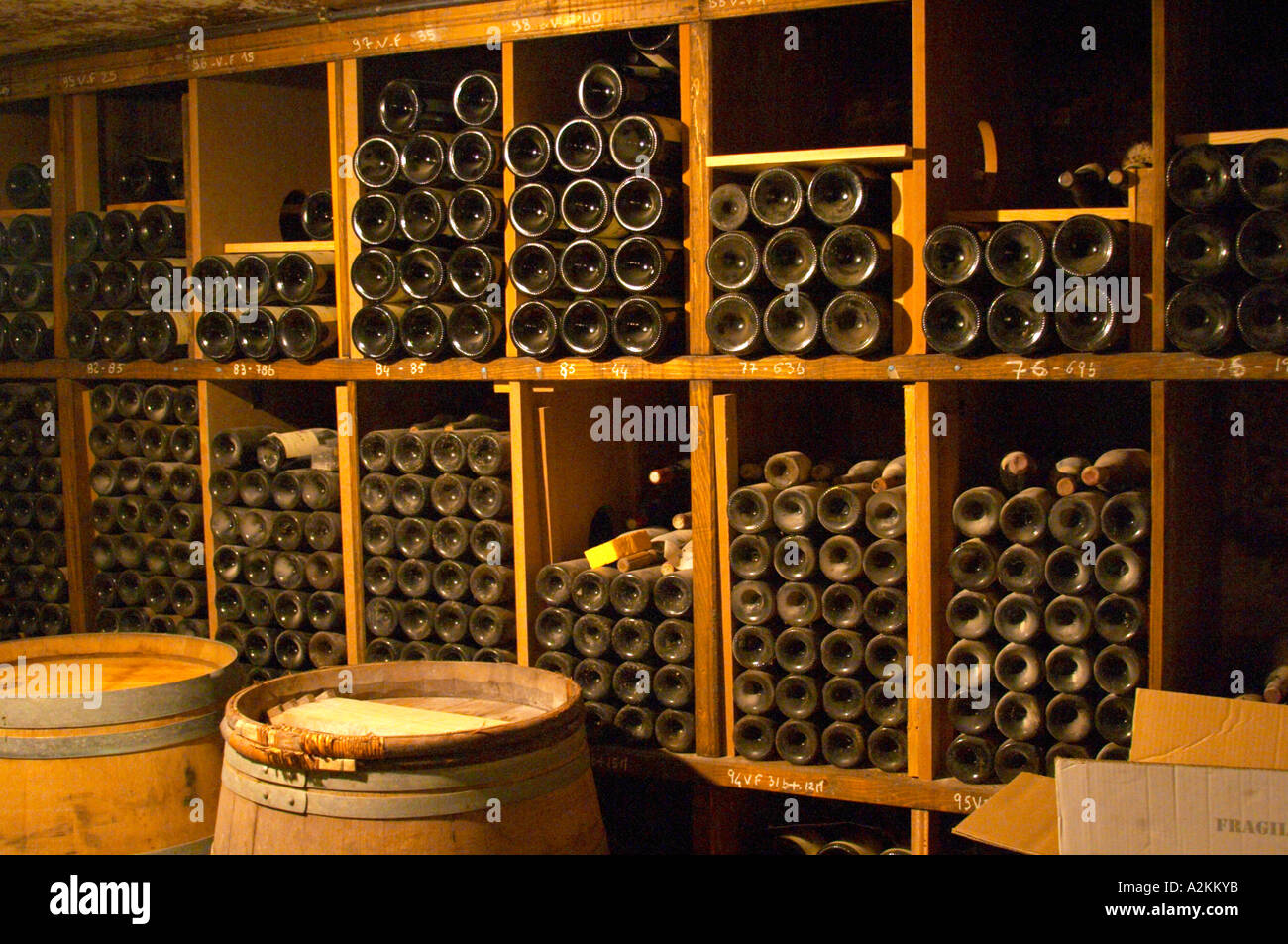 Older vintages of wine aging in the cellar. Alain Voge, Cornas, Ardeche, Ardèche, France, Europe Stock Photo