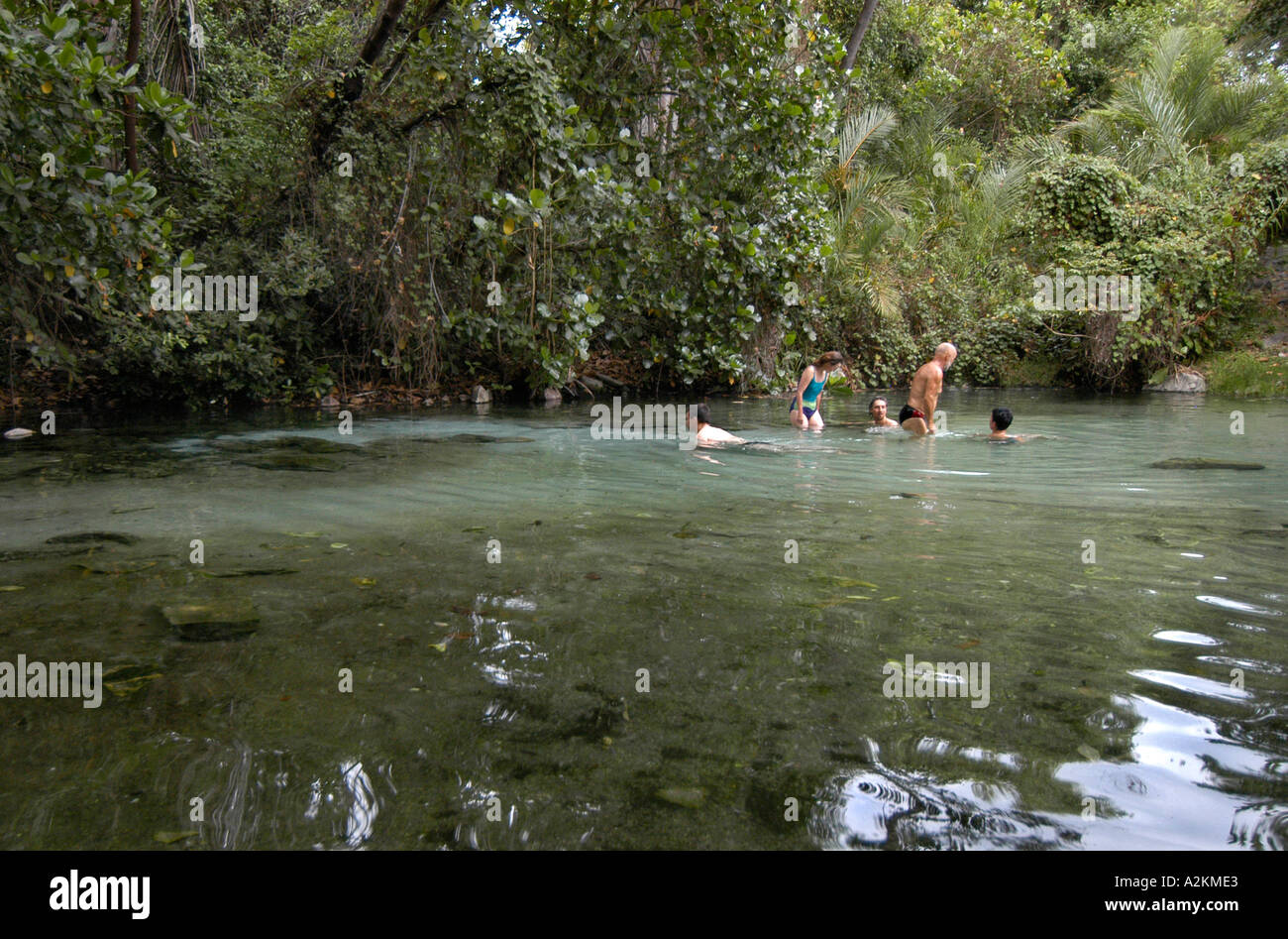 Naked Woman Bathing In Local River Used Communally Near