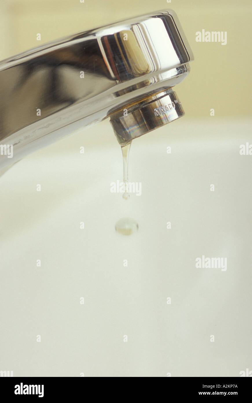 Water drips from a faucet Stock Photo Alamy
