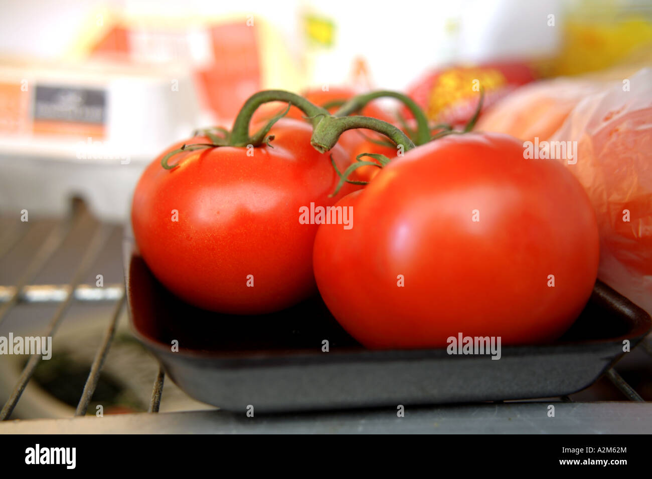 Tomatoes in fridge Stock Photo Alamy