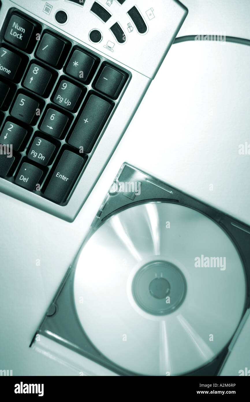 Computer keyboard and CD Stock Photo - Alamy