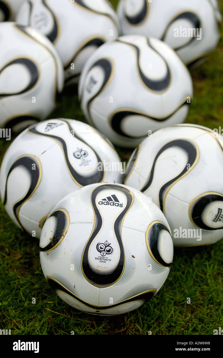 many Adidas Teamgeist footballs bunched on the ground Stock Photo - Alamy