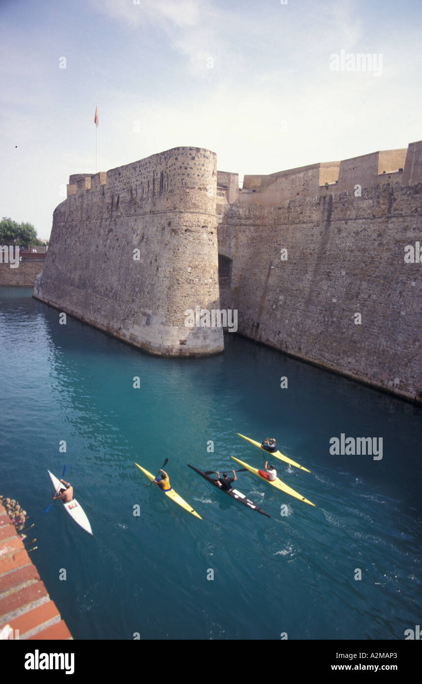 Europe, Spain (in Spanish northern Africa), Ceuta, royal walls and waterway with kayakers Stock Photo