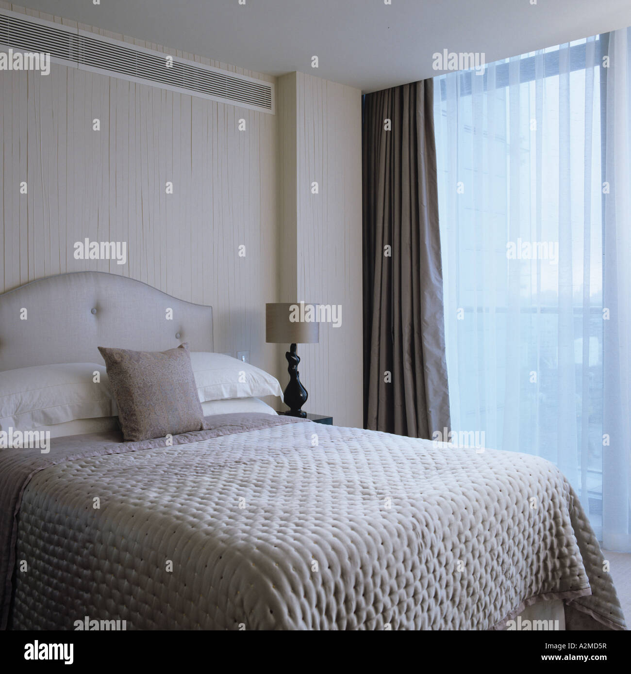 double bed with cushion