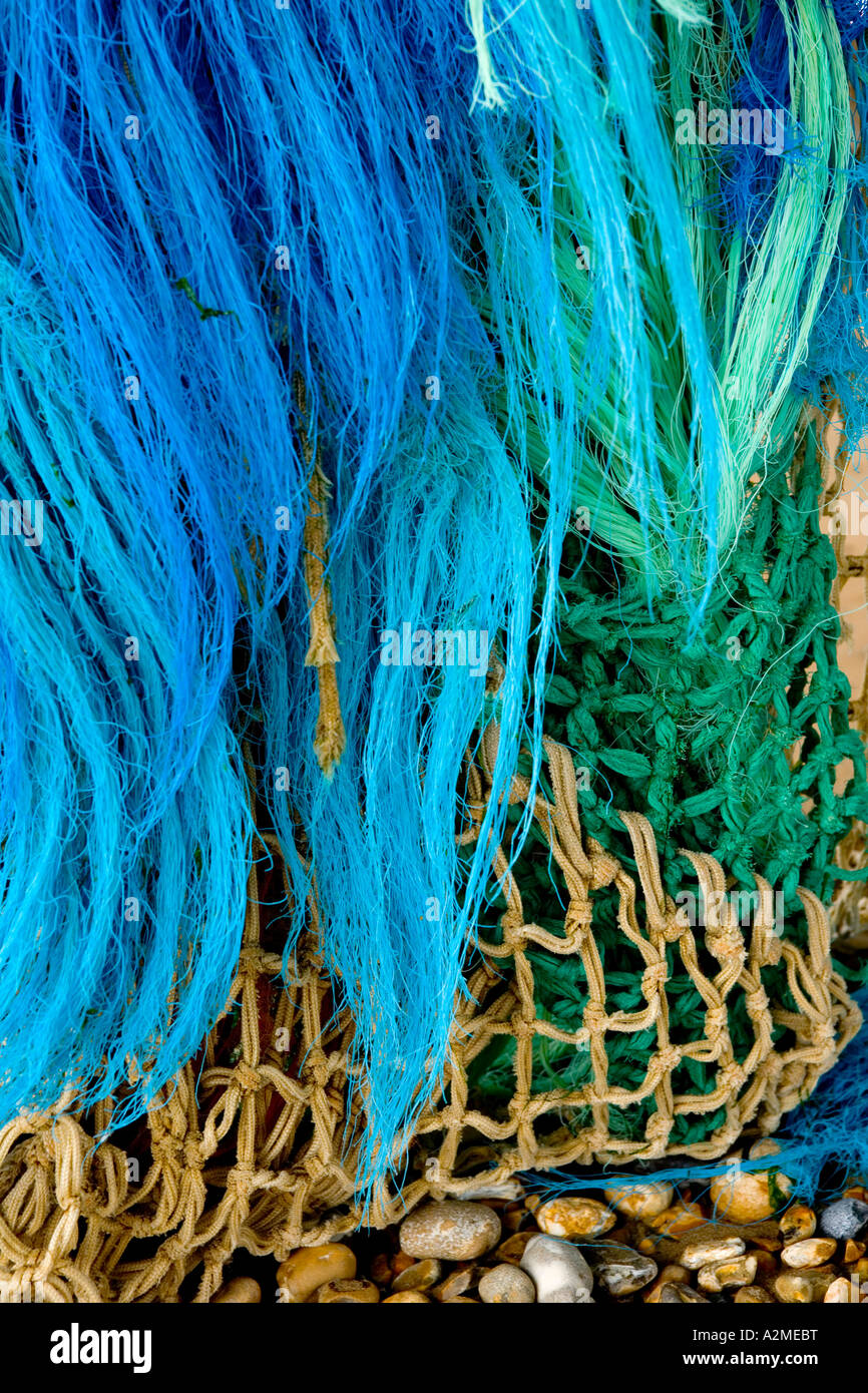 Colorful Rope Nets Close-up of colourful fishing nets, ropes, twine and pebbles Stock ...