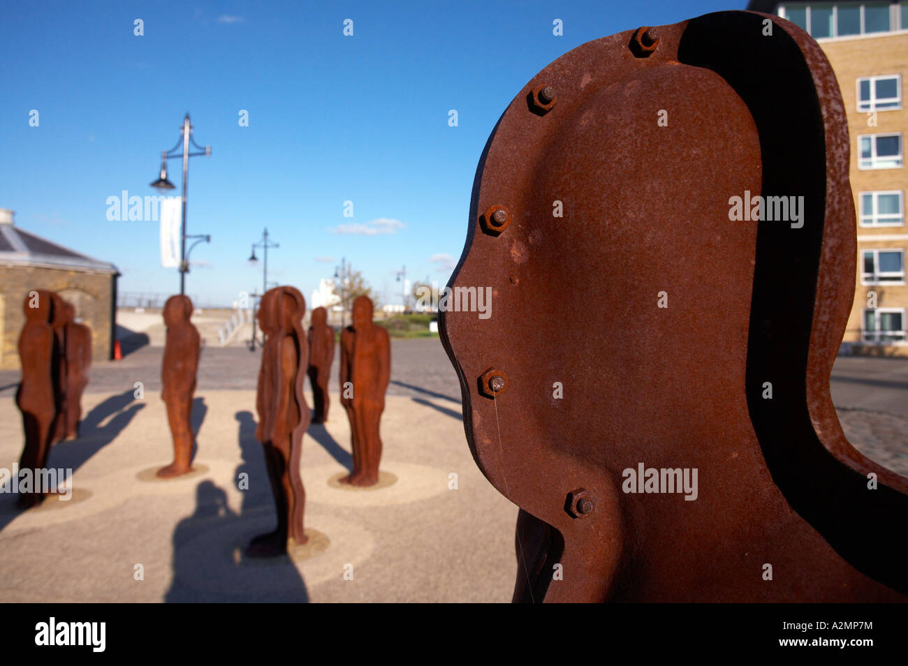 Peter Burke's iron men sculptures called Assembly at Woolwich London UK ...