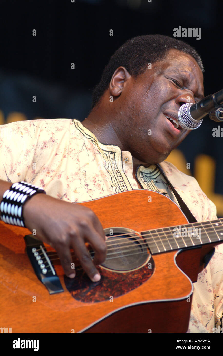 South African guitarist and vocalist Vusi Mahlasela on stage at WOMAD