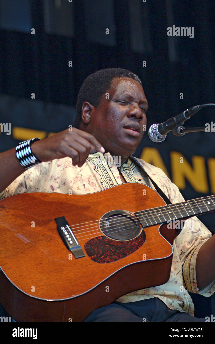 South African guitarist and vocalist Vusi Mahlasela on stage at WOMAD