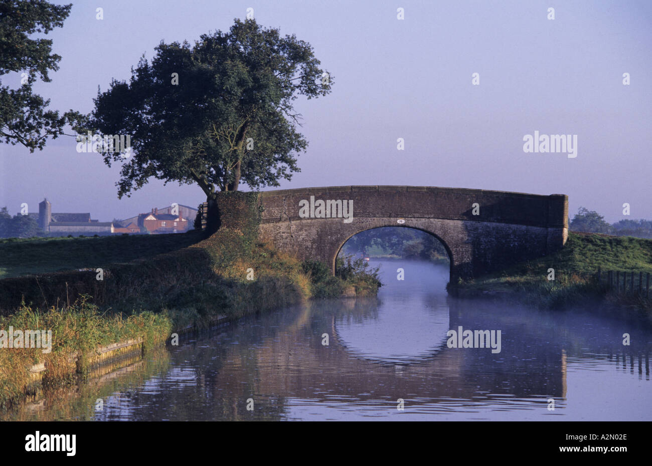 a bridge spanning the langollen canal north Wales on a misty morning Stock Photo