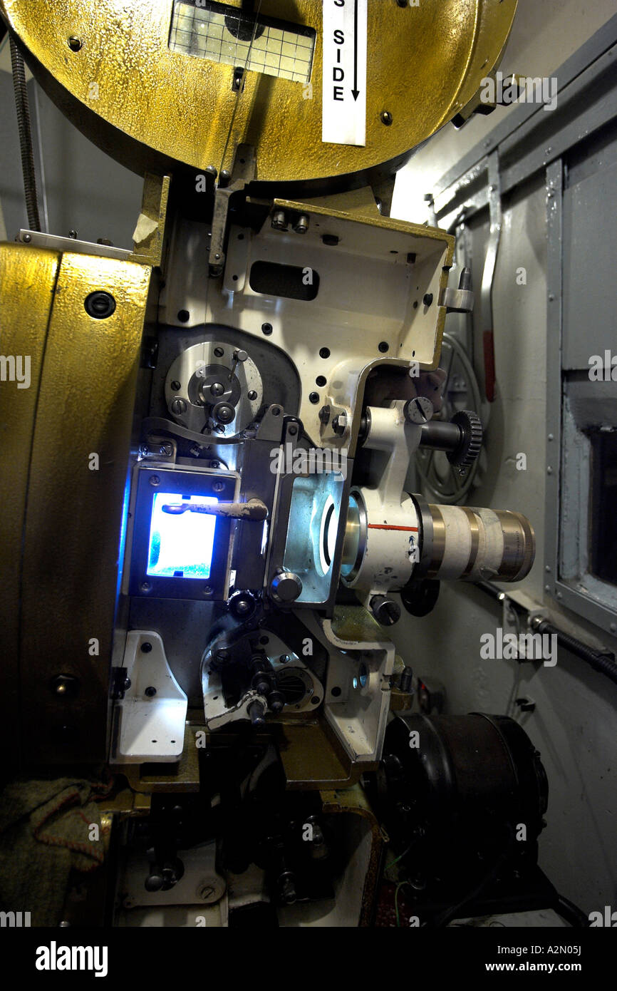 Royalty Cinema inside projection room & projectionist & projector Stock